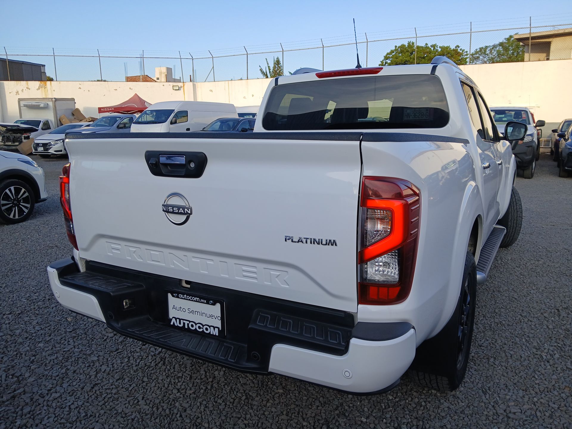 2023 Nissan FRONTIER PLATINUM LE TA 23