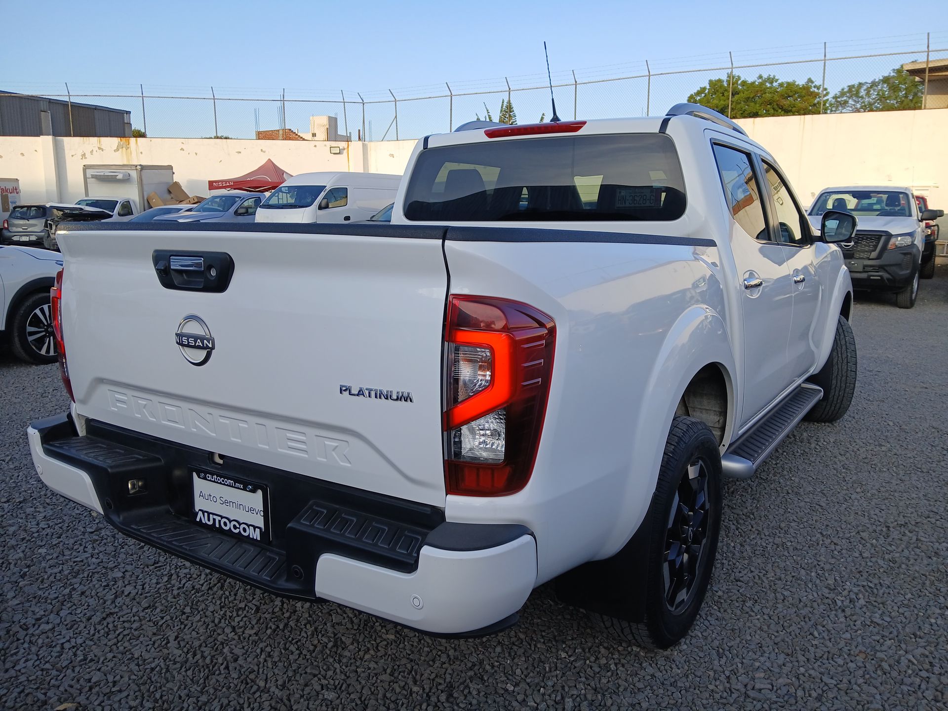 2023 Nissan FRONTIER PLATINUM LE TA 23