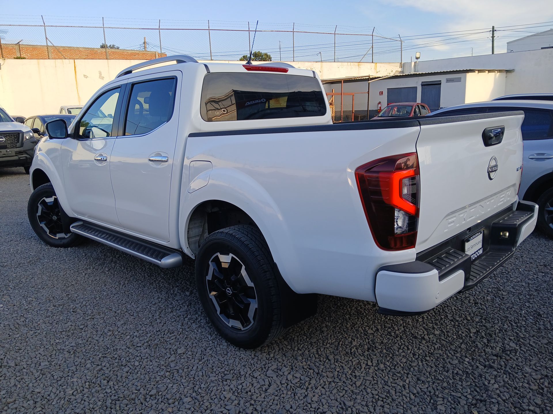 2023 Nissan FRONTIER PLATINUM LE TA 23