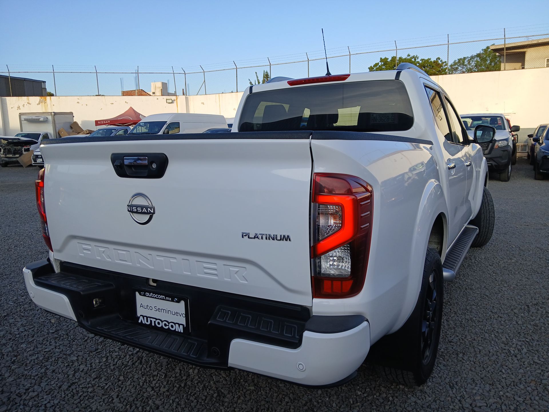 2023 Nissan FRONTIER PLATINUM LE TA 23